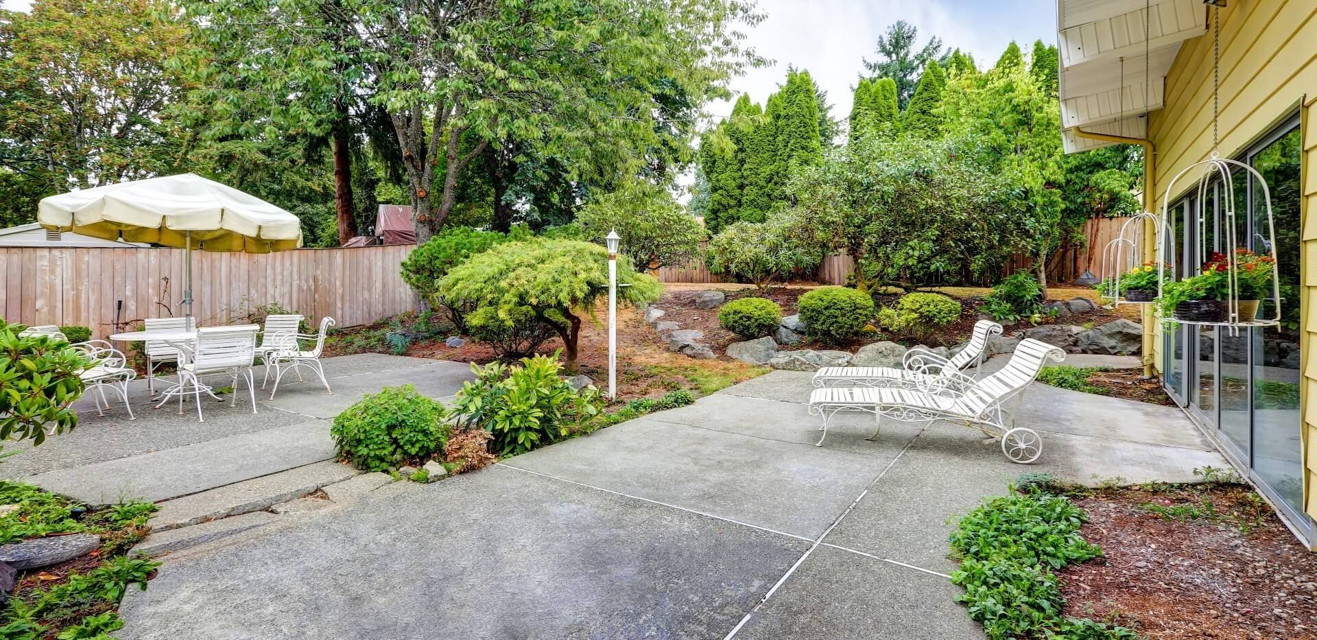 Improve your home and give it a boost with a beautiful backyard concrete patio