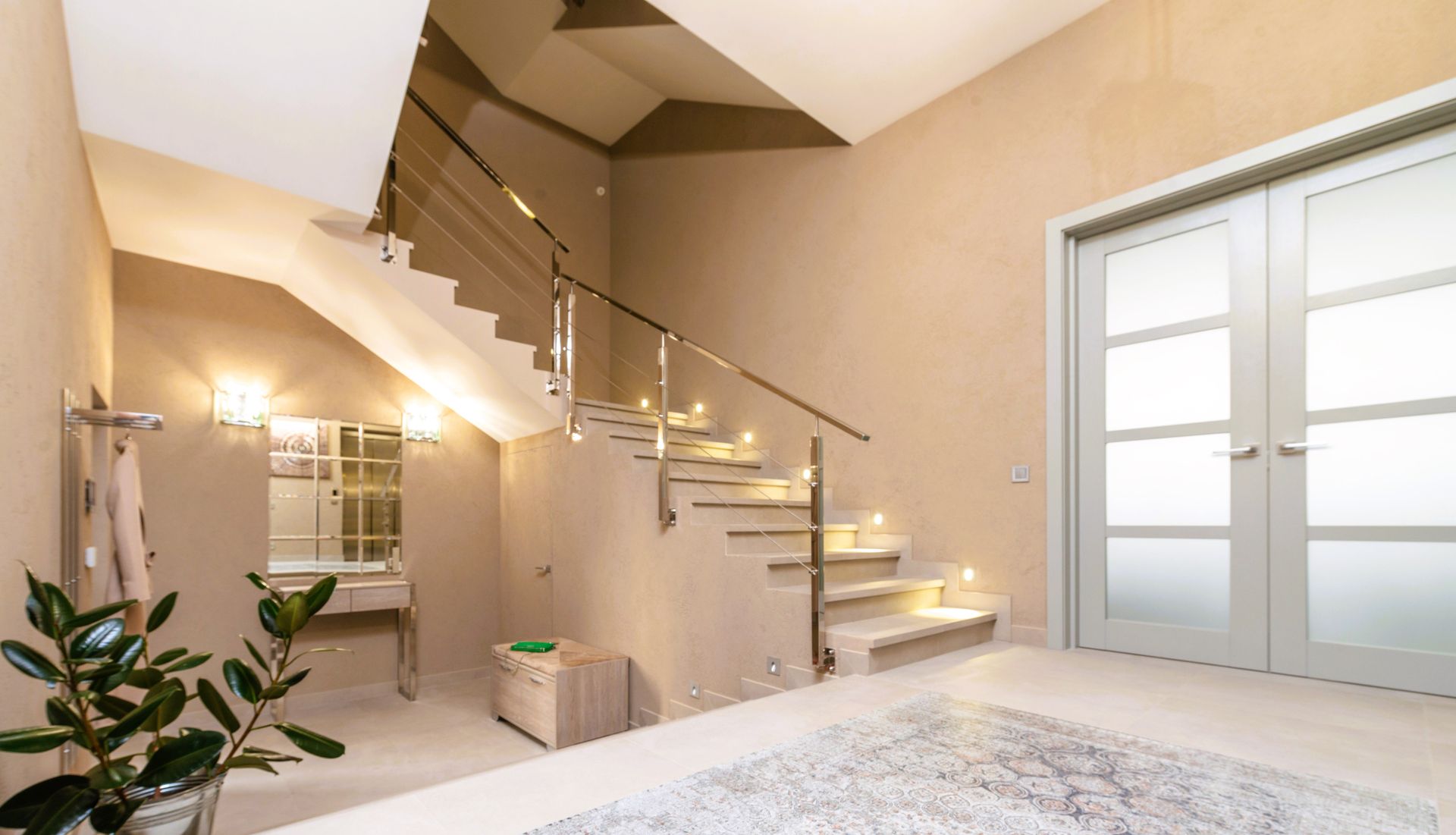 Well-lit concrete staircase in a modern residence