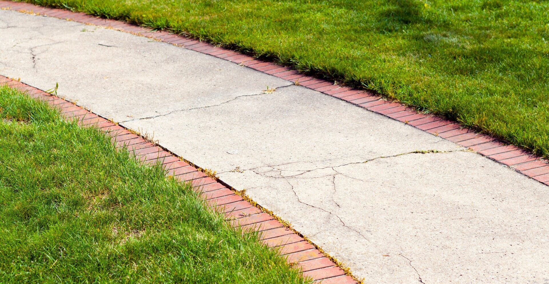 Small cracks are all over the concrete showing signs that it needs some concrete resurfacing