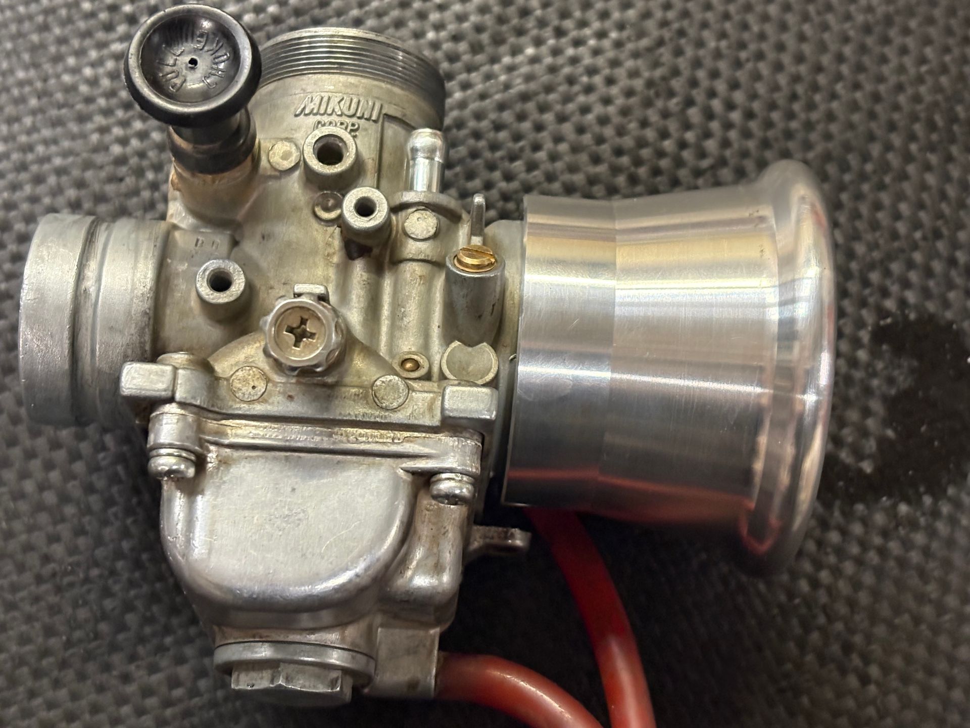 PlazCutz Racing Products are specialist supermoto, supermini and pit bike track racing components carburettor bell mouth throttle body
