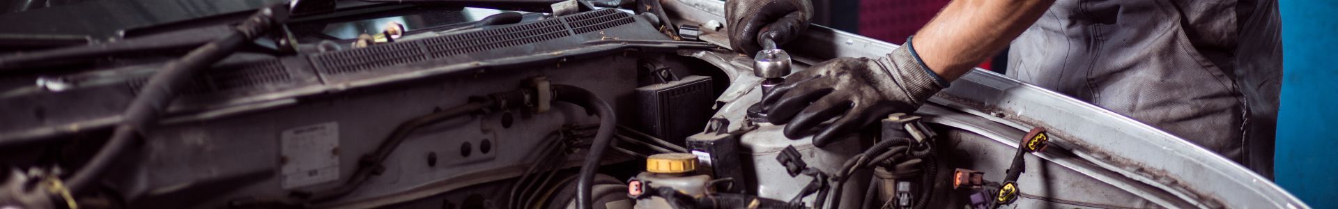 Mechanic performing an auto repair service