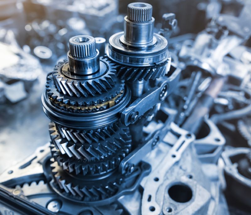 Close-up of intricate gears and components in a transmission service
