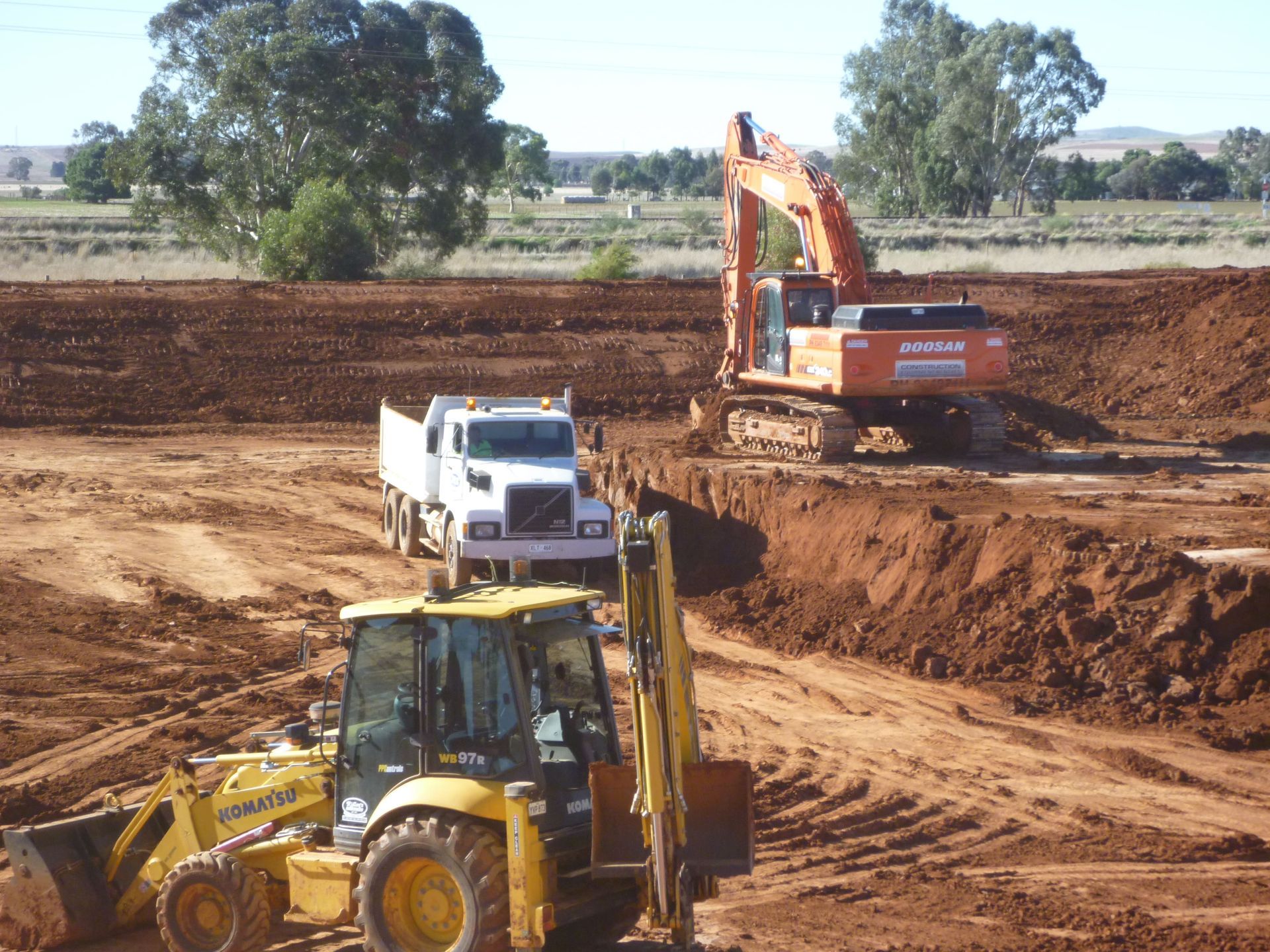 A doosan excavator sits in a dirt field | Murray Bridge, SA | Ridleys SA