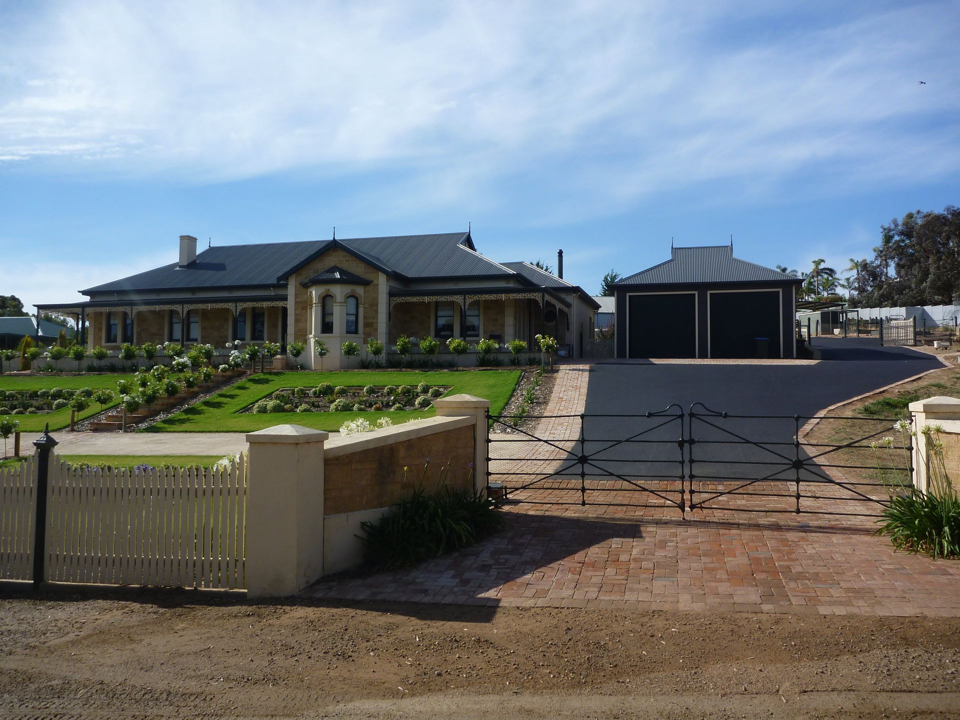 A brick driveway leads to a large house | Murray Bridge, SA | Ridleys SA
