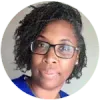 A woman wearing glasses and a blue shirt is smiling in a circle.