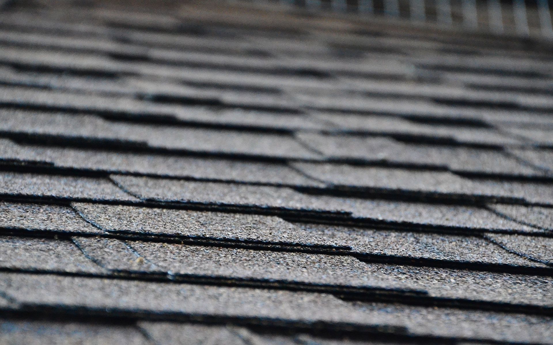 A close up of a roof with shingles on it.
