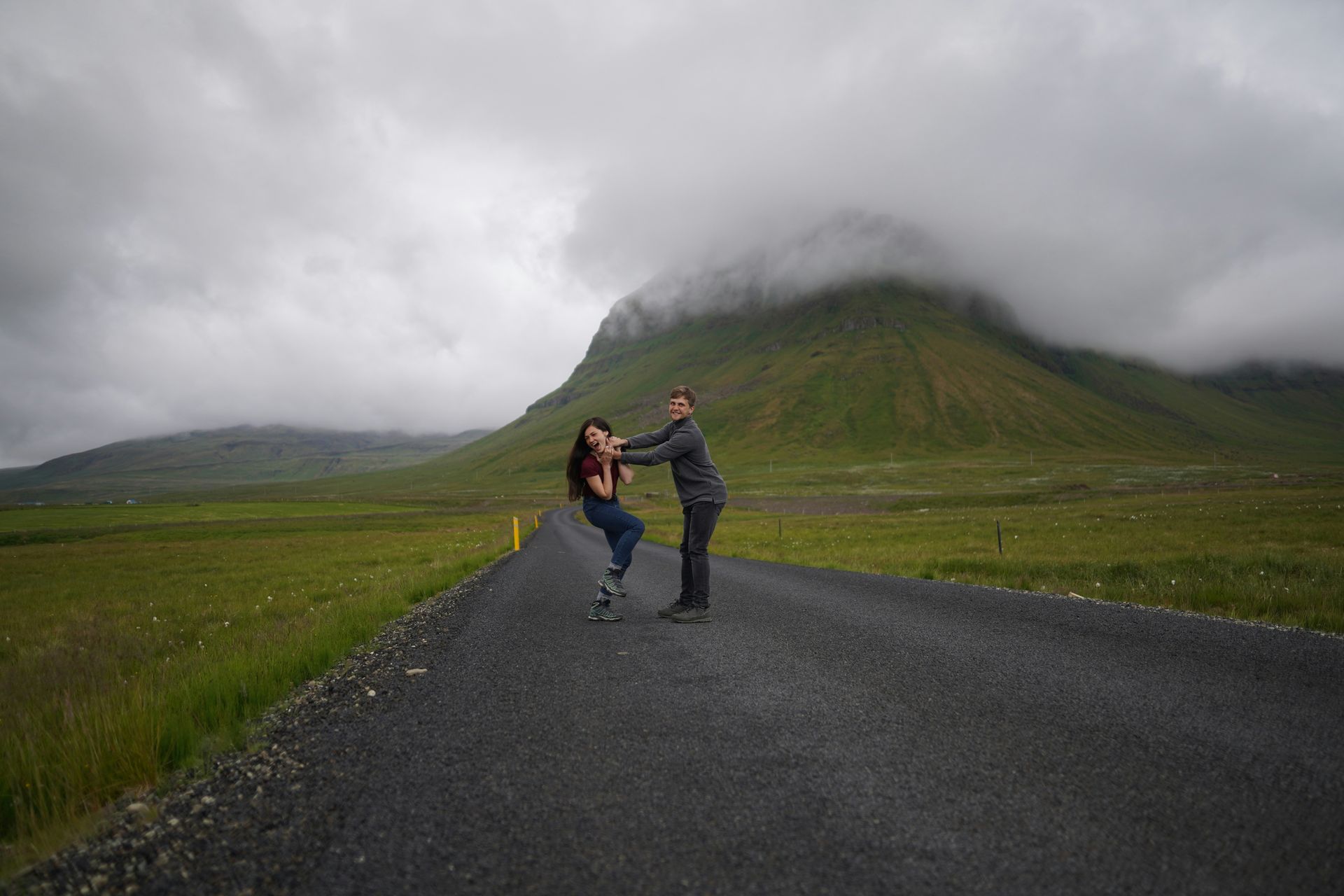 Two guests standing in the Icelandic landscape
