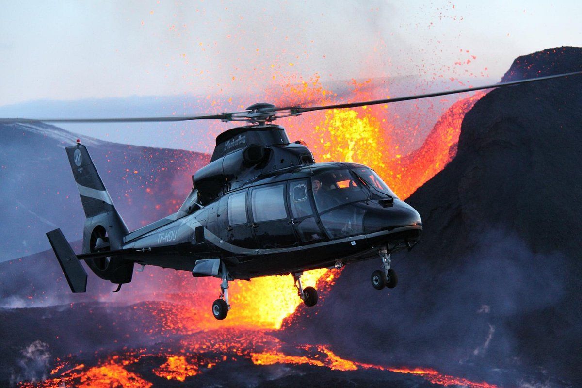 Flying with a helicopter over one of the volcanic eruptions at Reykjanes peninsula