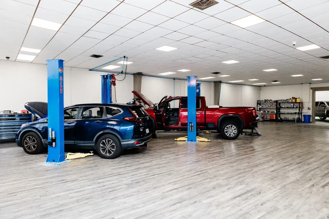 Cars Parked for Repairs in Auto Shop | Best Mechanic in Pensacola, FL - Pensacola AC & Auto Service Center