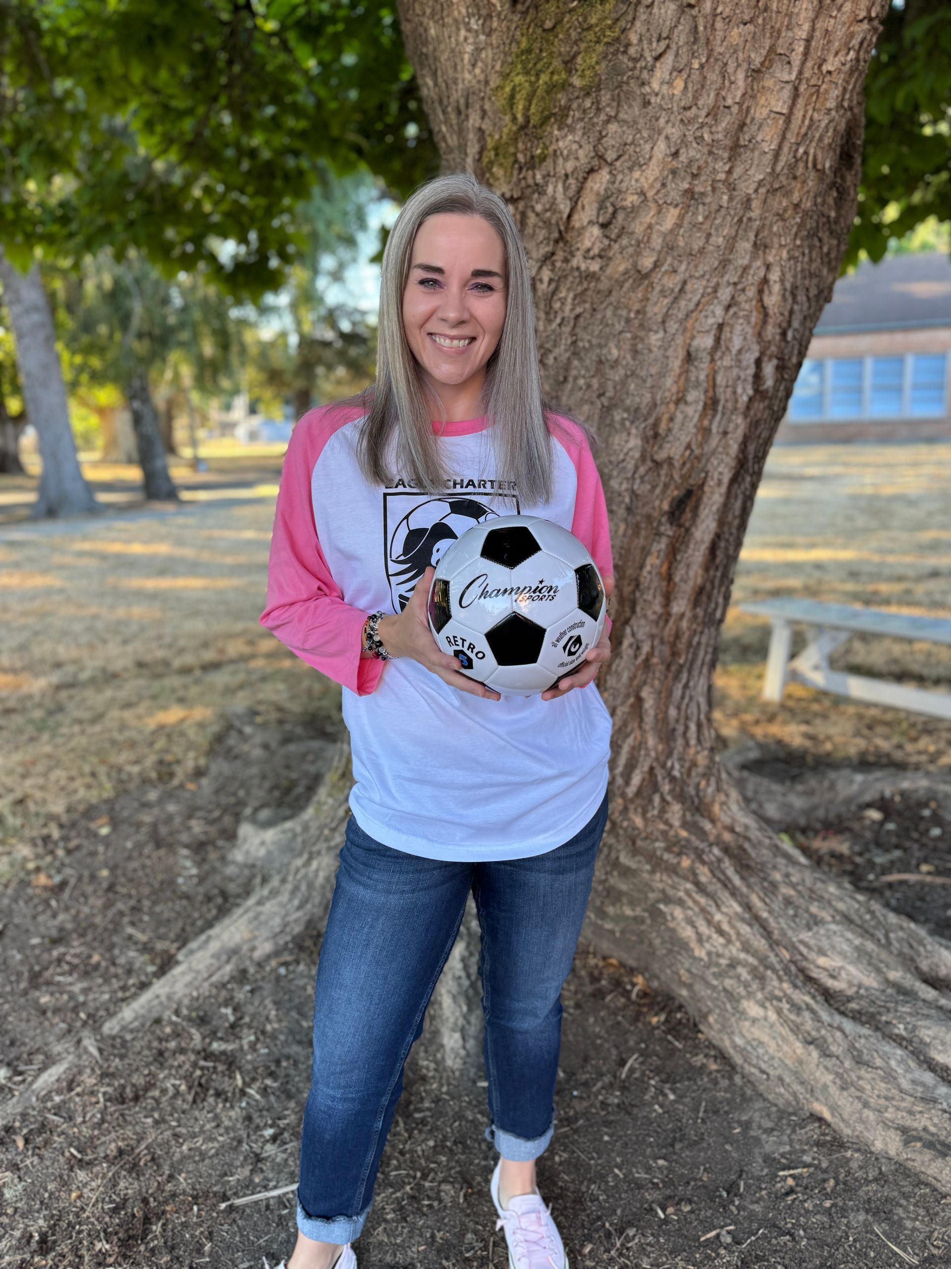 Special Education IA. Holding a soccer ball.