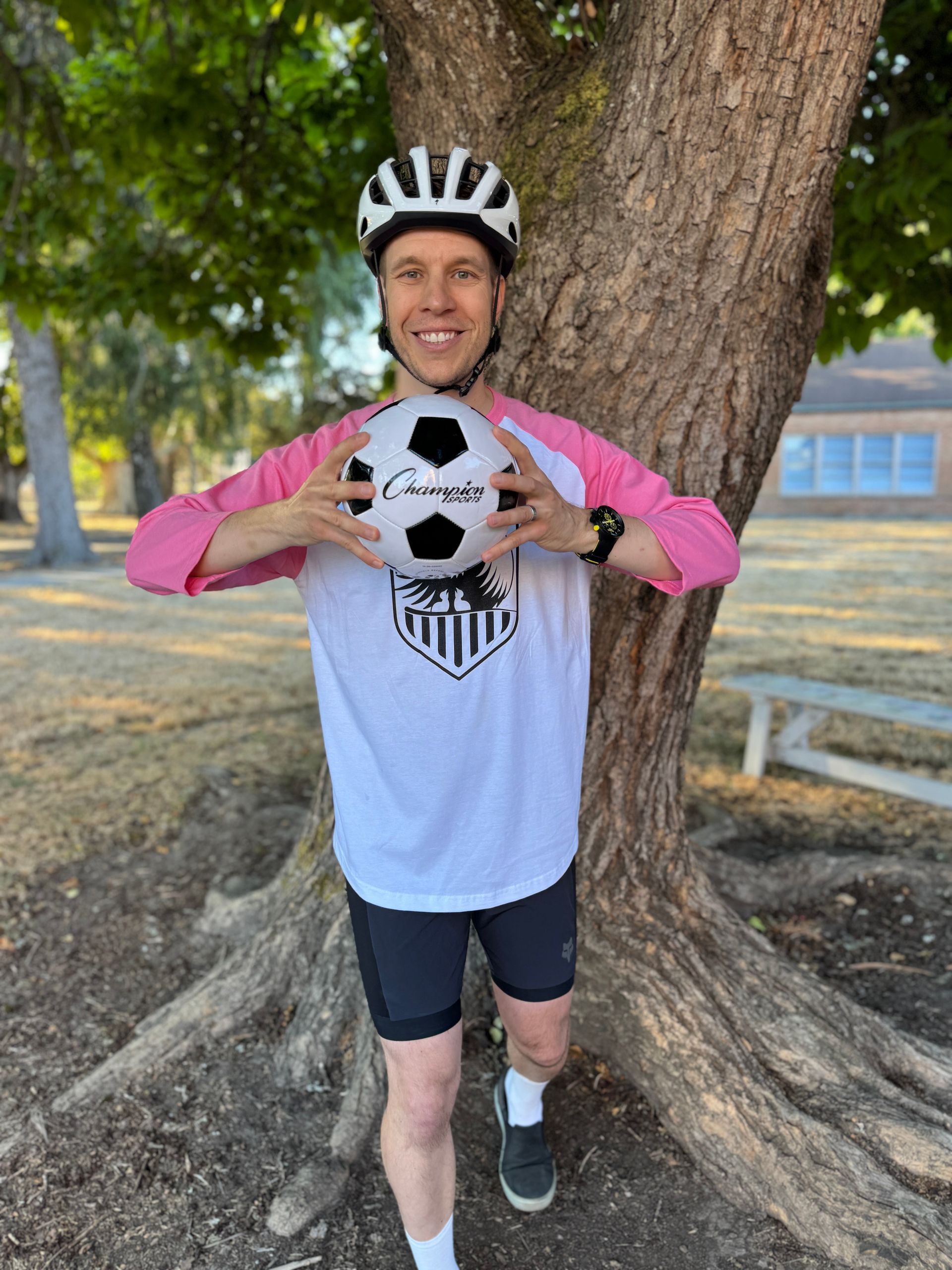 TOSA. Male holding soccer ball.