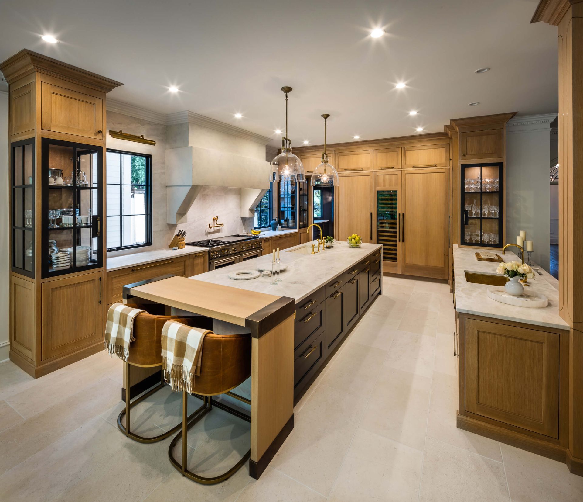 There is a large island in the middle of the kitchen.