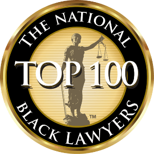A gold and black seal featuring a figure holding scales of justice, reading