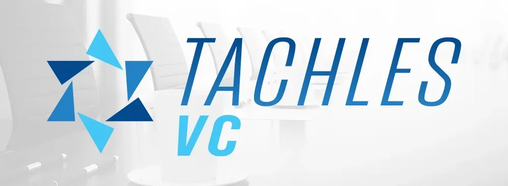 Tachles VC logo in blue and gray with stylized geometric pinwheel icon