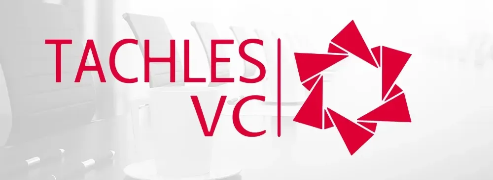 TACHLES VC logo in red with a geometric starburst icon on a light gray background