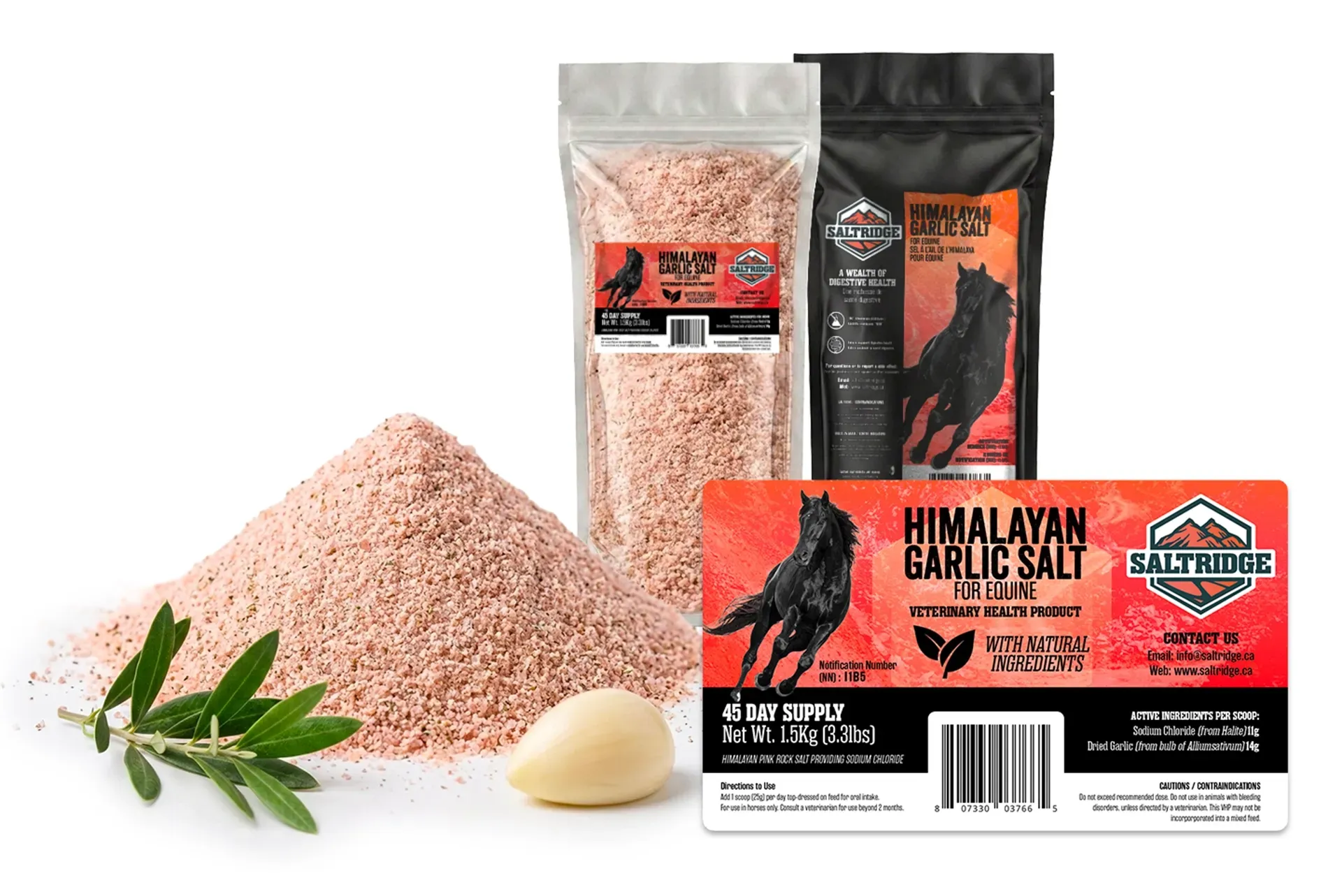 Pink Himalayan salt in bags and a pile, with garlic clove and herb sprig on white background