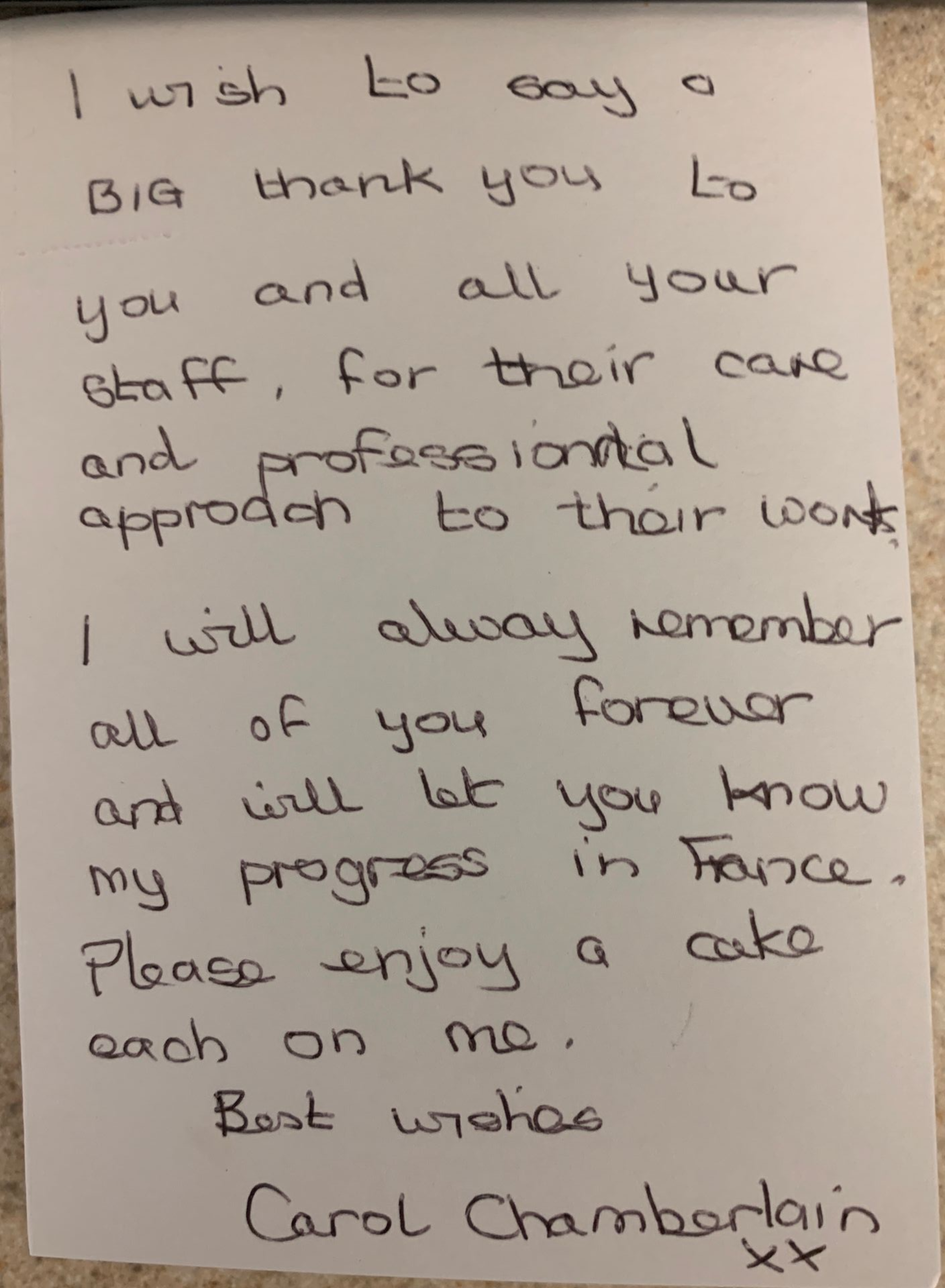Handwritten thank-you note on paper, mentioning staff and progress in France, signed Carol Chamberlain