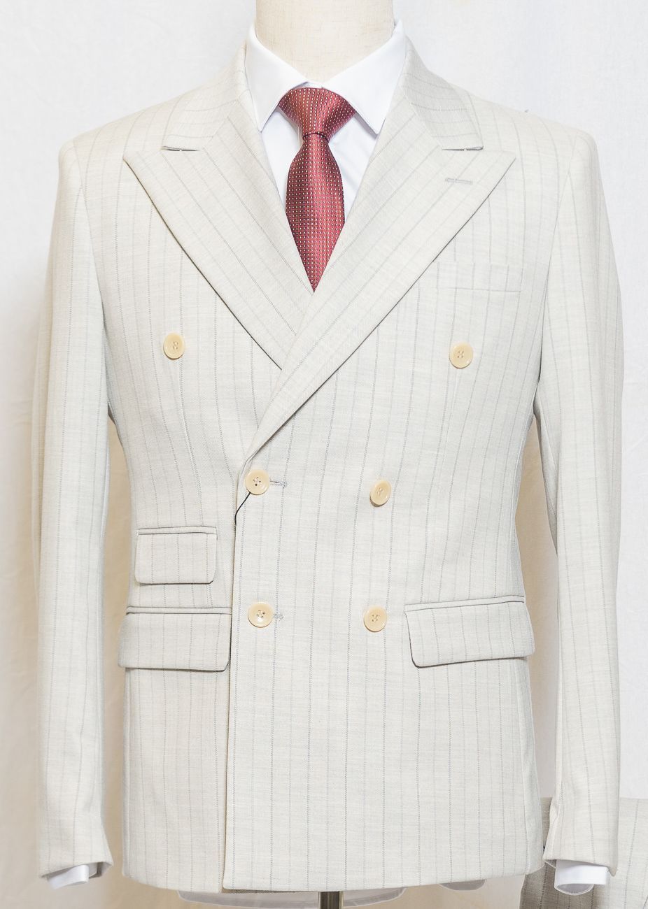 Three-piece set with gray stripes. One button, center split
