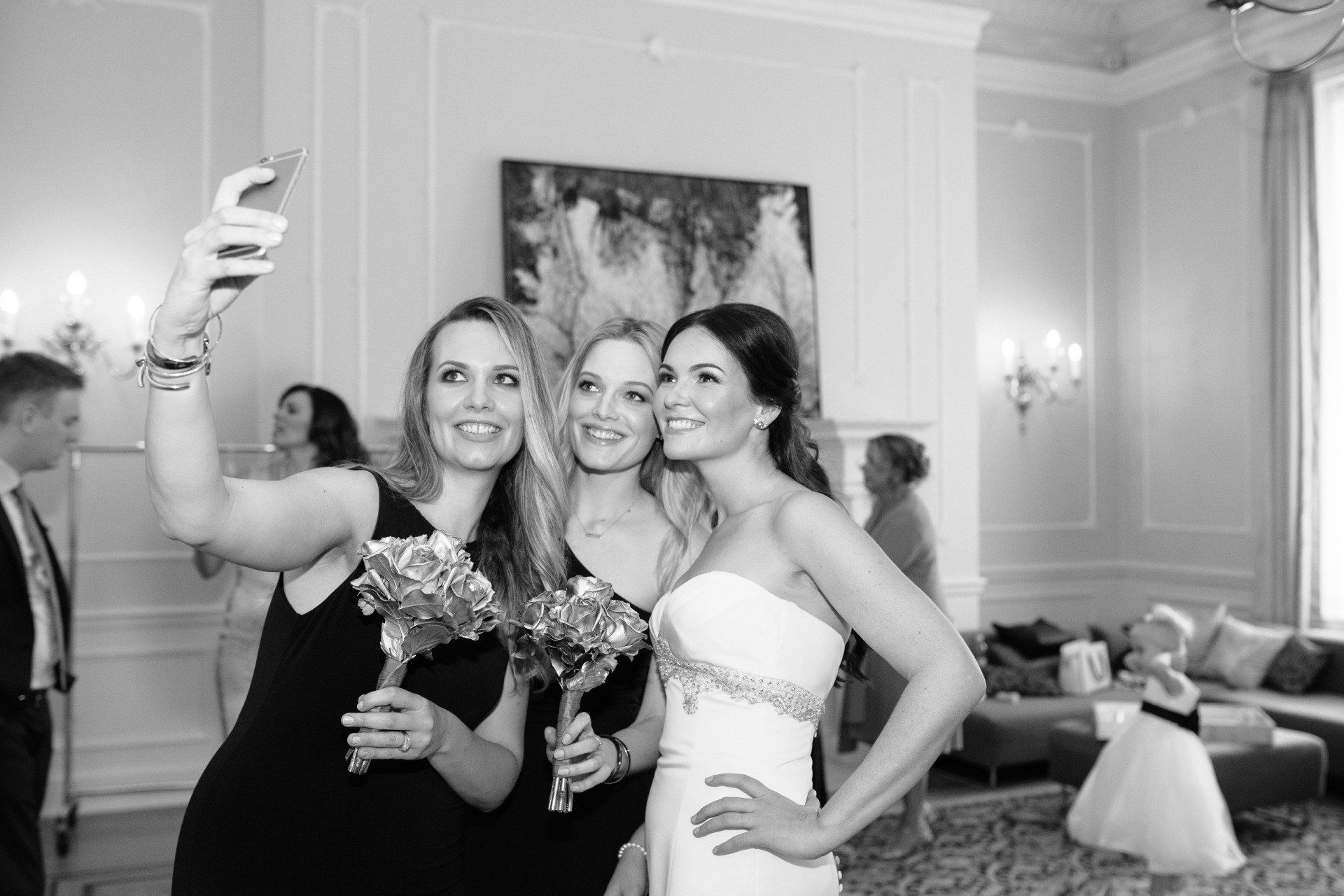 Bridesmaids taking selfies