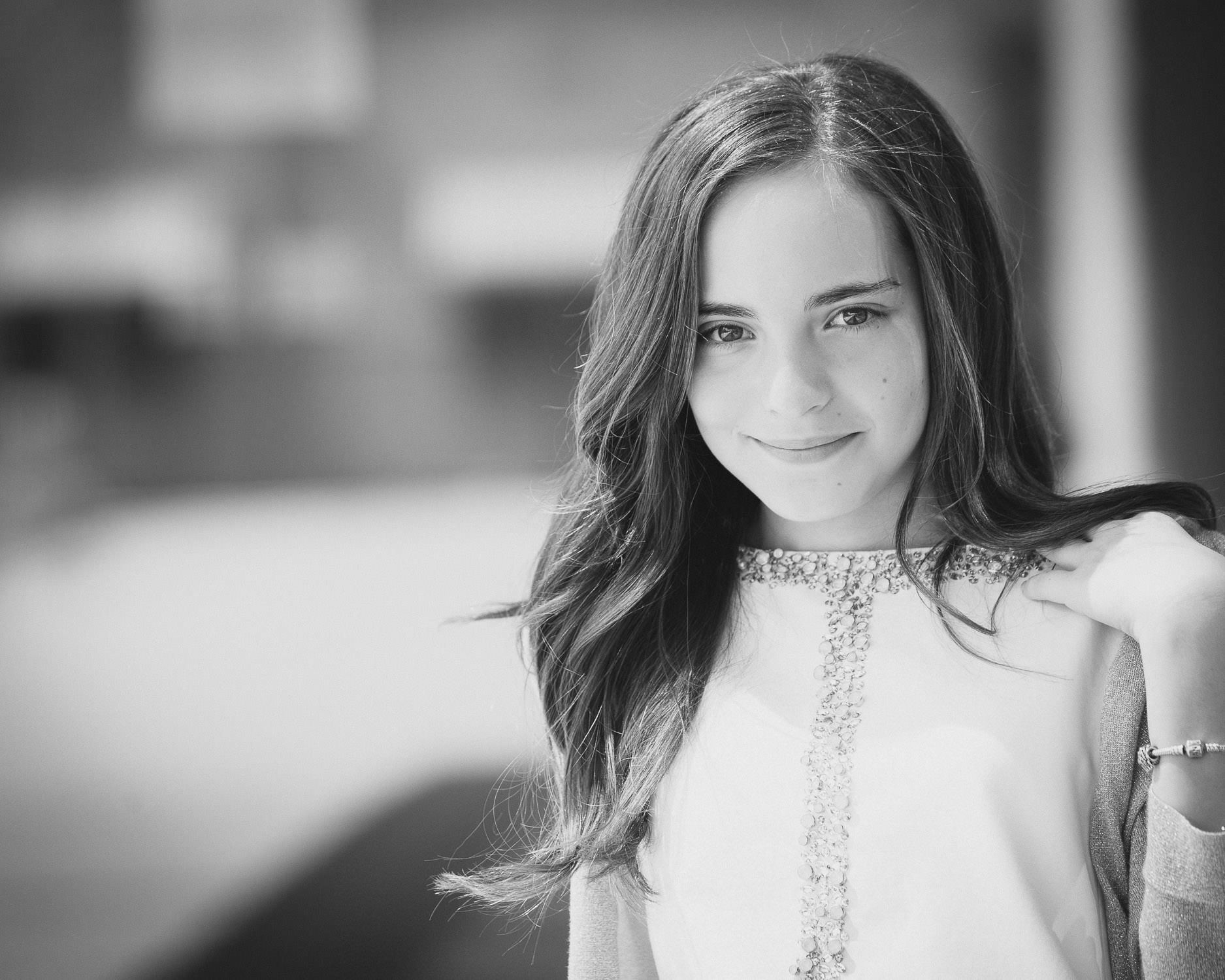 Black and white portrait photo of a young girl