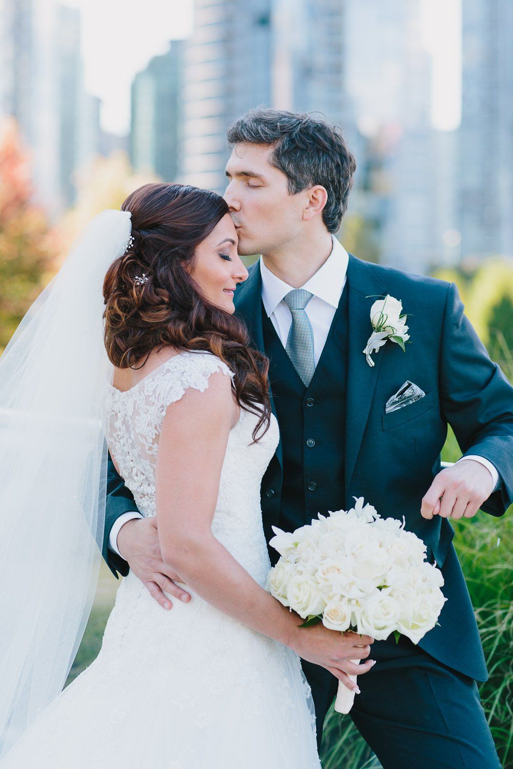 Just married - bride and groom sharing an intimate moment