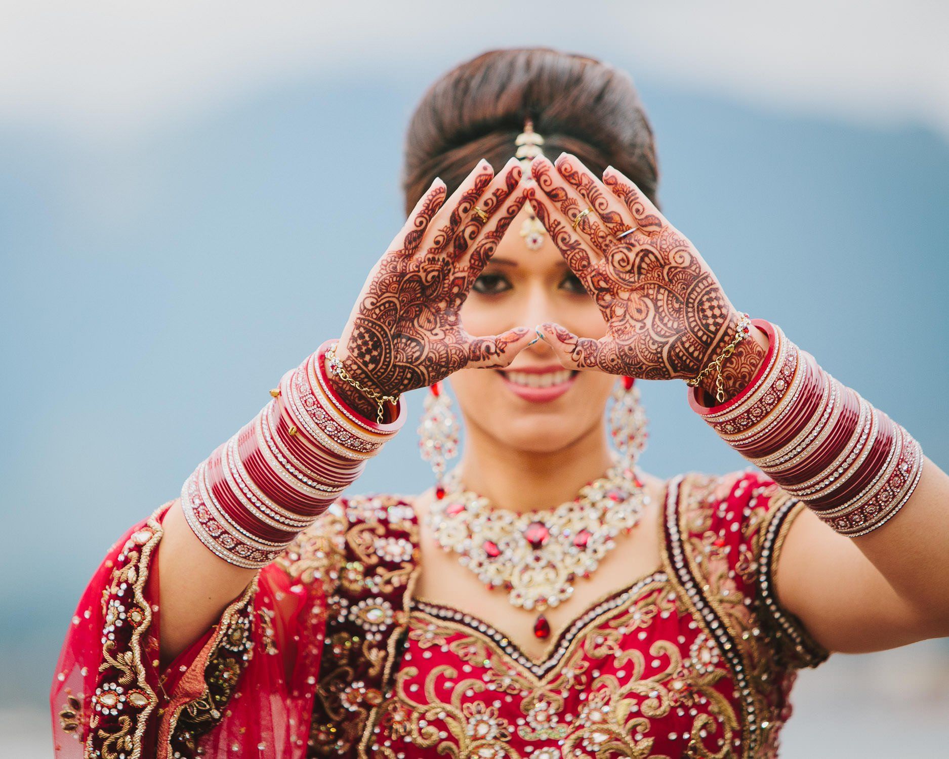 Bride with henna hand tattoos