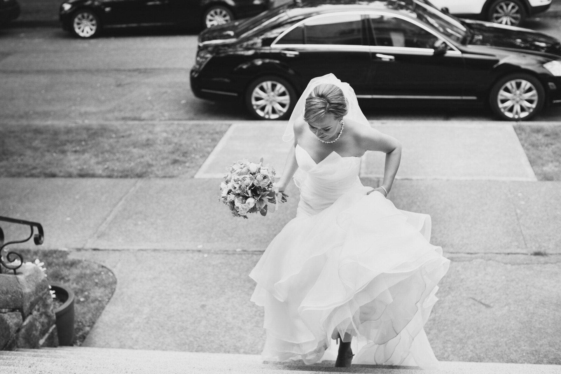 Bride running up the steps