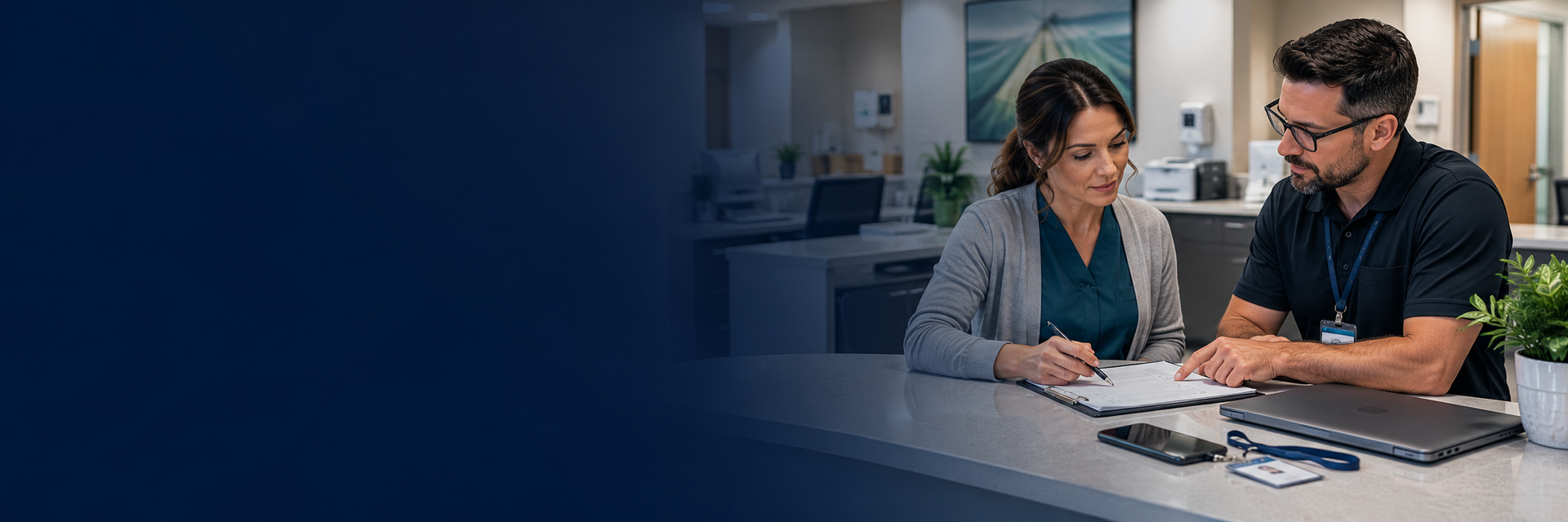Healthcare administrator and IT professional review a secure employee offboarding checklist in a med