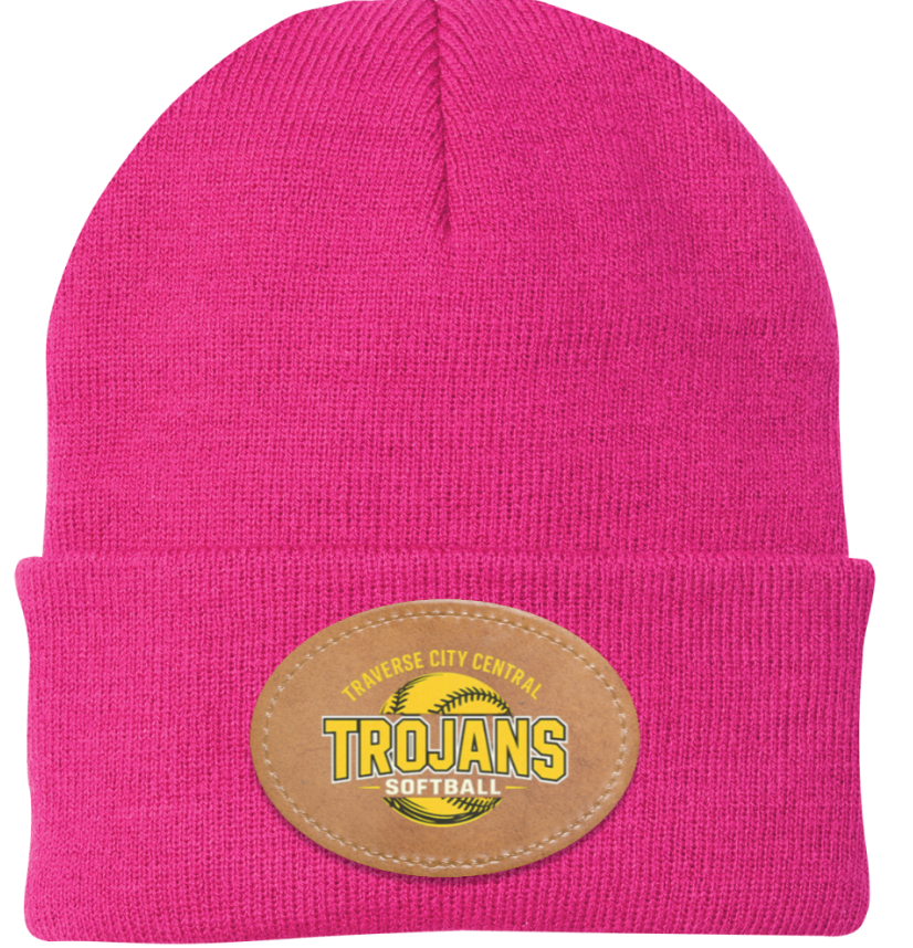 Bright pink knit beanie with an oval leather patch featuring a yellow softball and the text