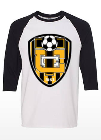 White and black raglan shirt with yellow shield soccer crest and ball graphic on the chest