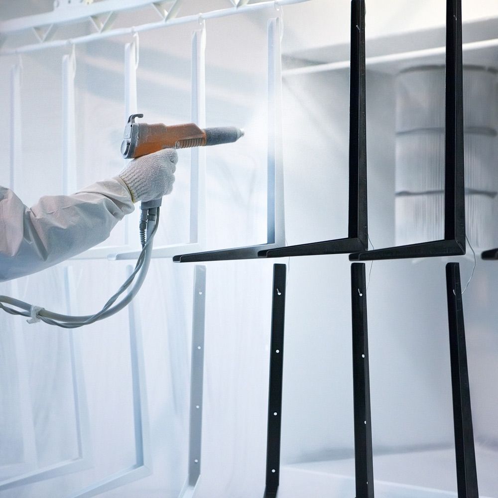 Hand Holding Powder Coating Sprayer — Leisure Coast Powder Coaters in Unanderra, NSW