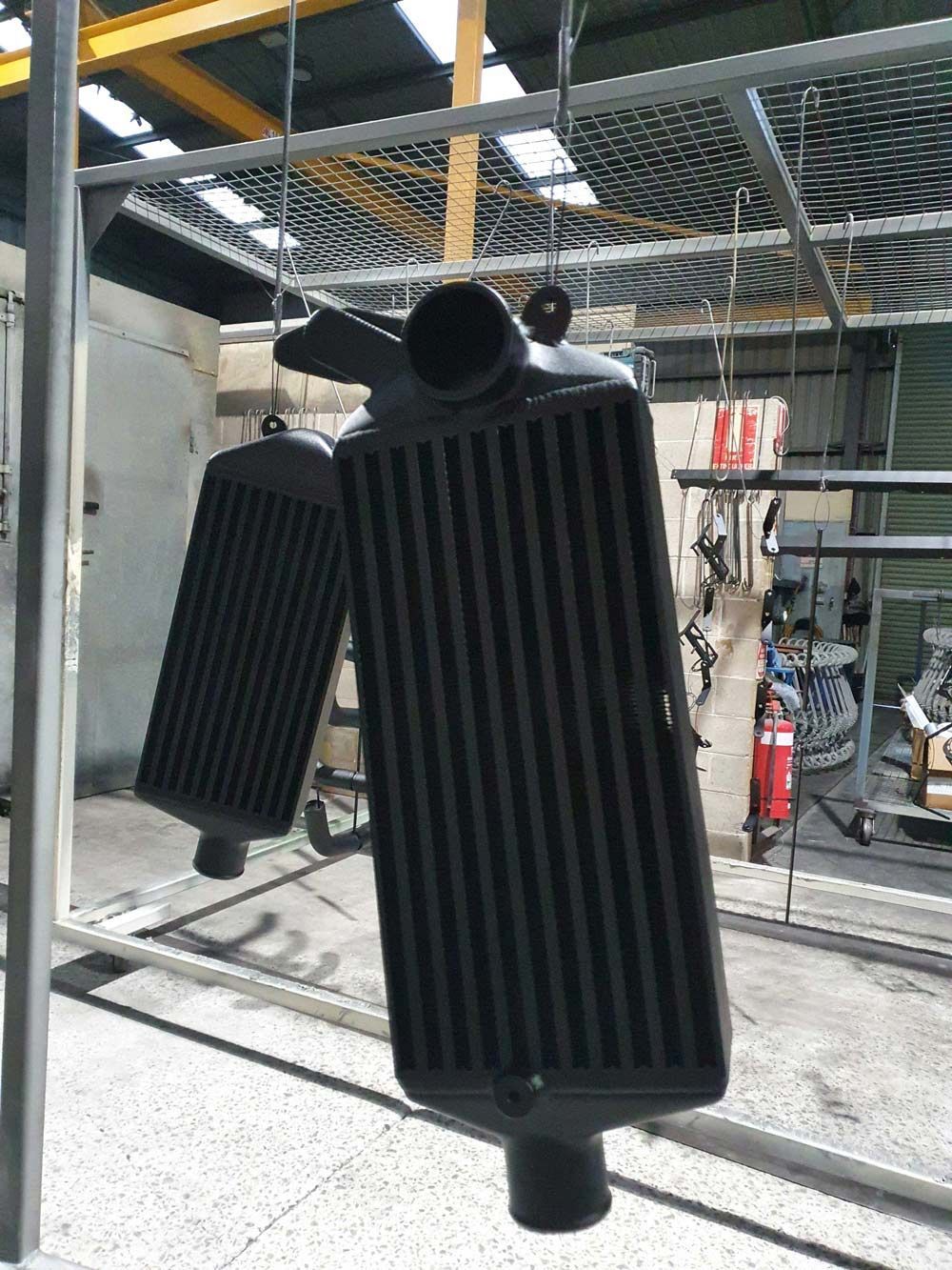 Powder Coated Metal at the Work Station — Leisure Coast Powder Coaters in Unanderra, NSW