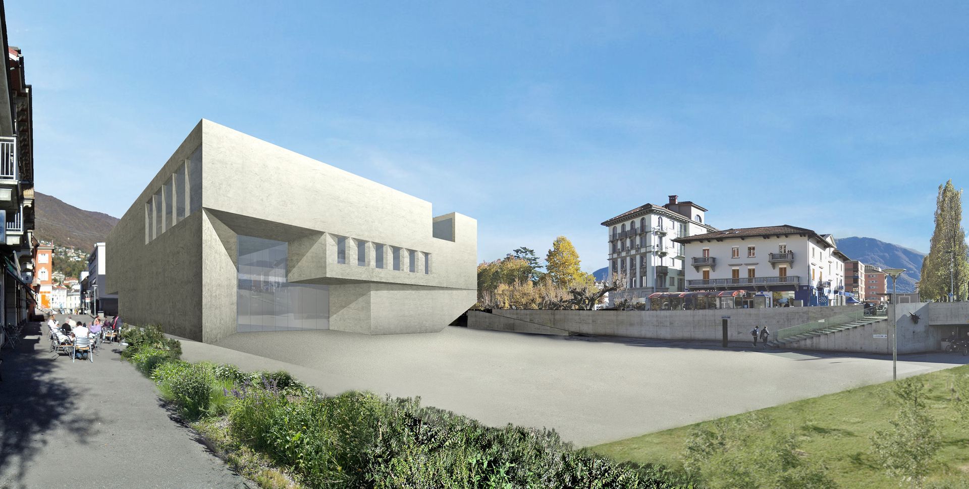 Un moderno edificio in cemento, una piazza vuota e vecchi edifici contro un cielo azzurro.