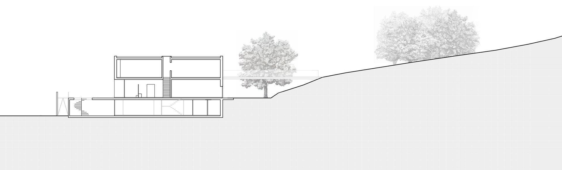 Sezione trasversale architettonica di un edificio a due piani su una collina. Sono visibili anche alberi e terreno.