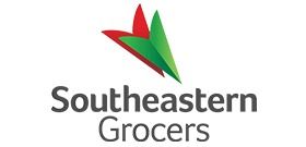 Logo of Southeastern Grocers, with a stylized green and red leaf design above the words