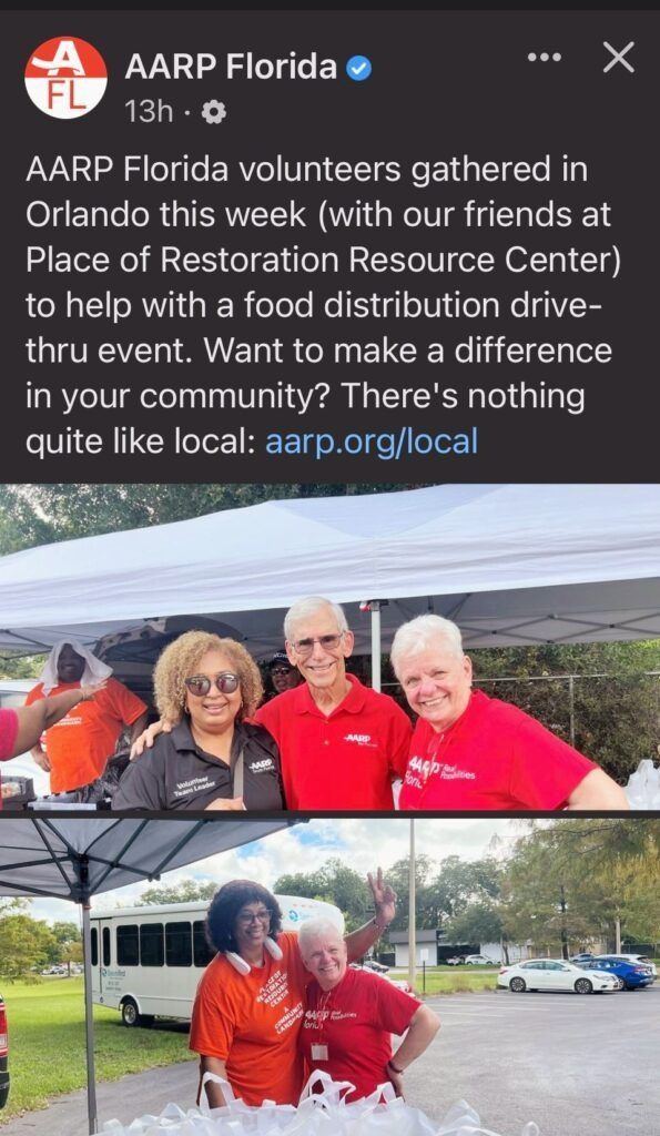 AARP volunteers at a food distribution event in Orlando. People are smiling.