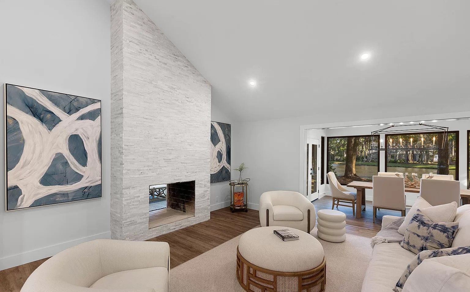A living room filled with furniture and a fireplace.