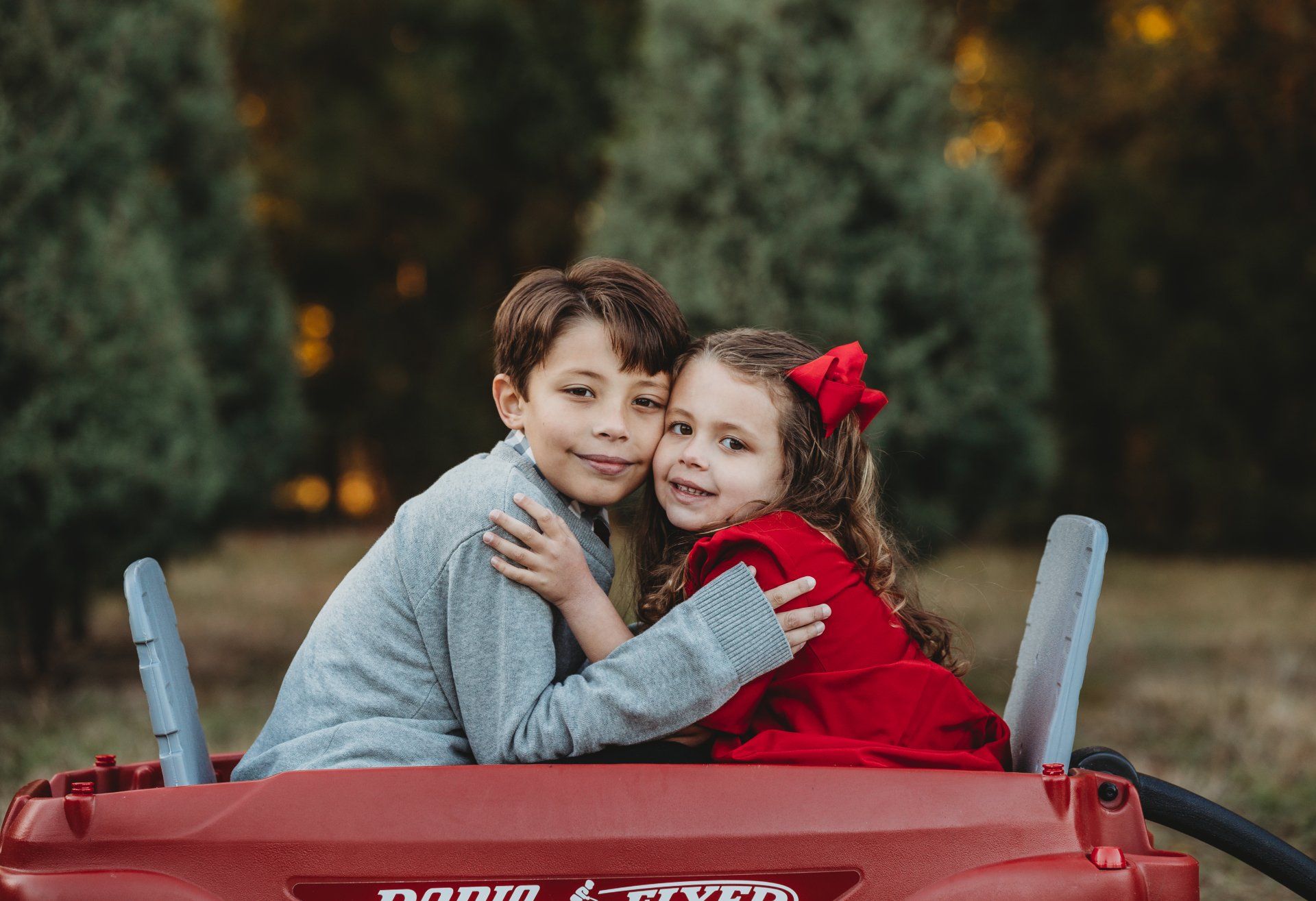 Capture magical holiday moments with family and friends among beautiful evergreen trees and festive decorations