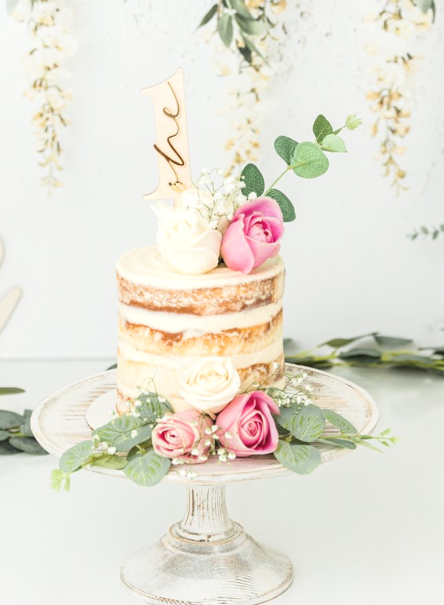 floral naked themed cake portraits for a cake smash session in studio - Cary NC