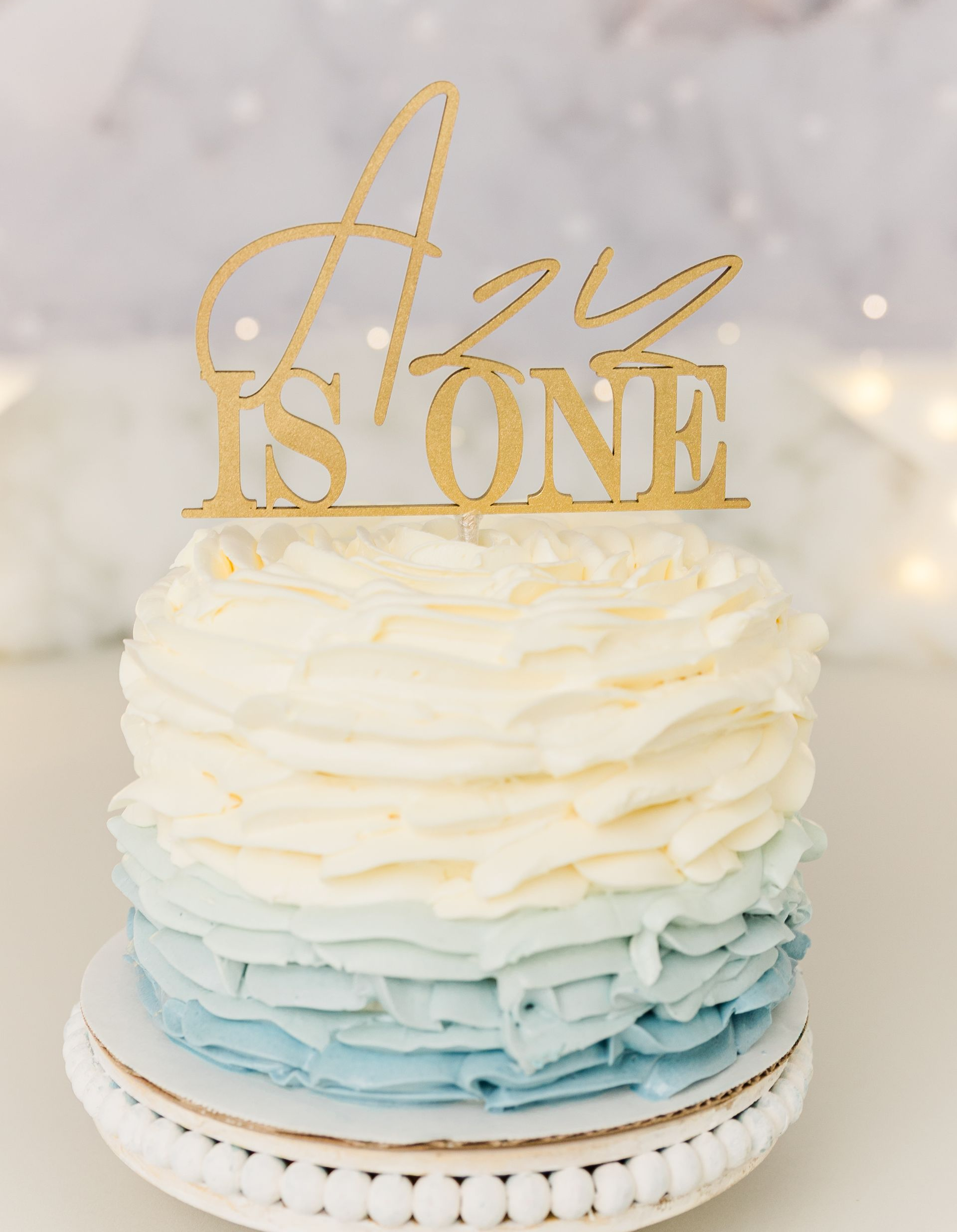 minimalist blue and white themed cake portraits for a cake smash session in studio - Cary NC