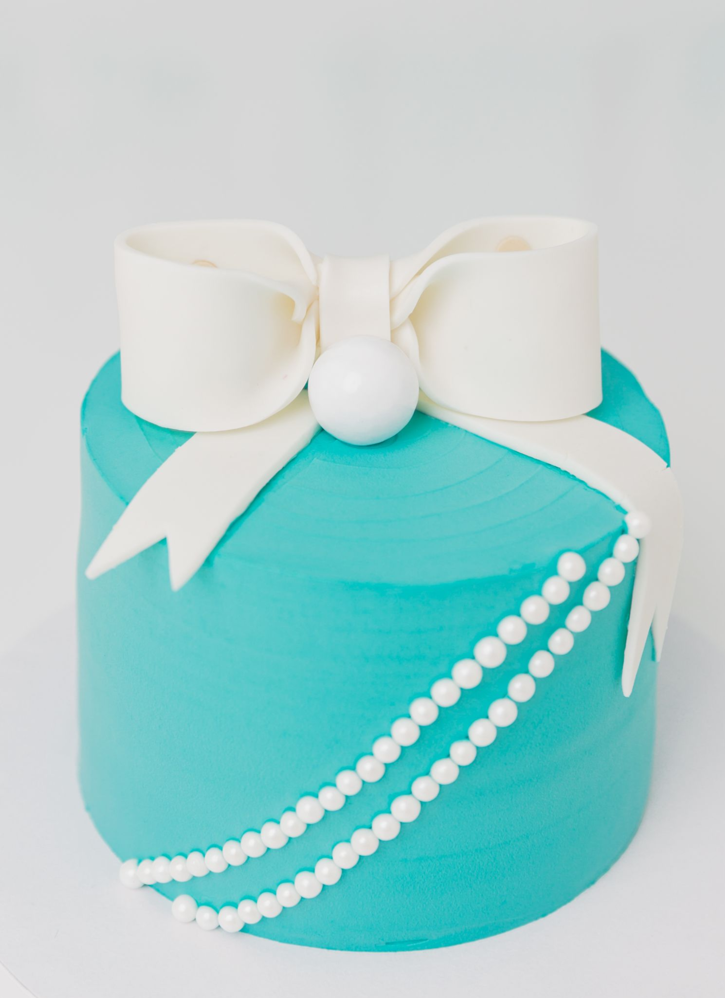 gorgeous tiffany themed cake portraits for a cake smash session in studio - Cary NC