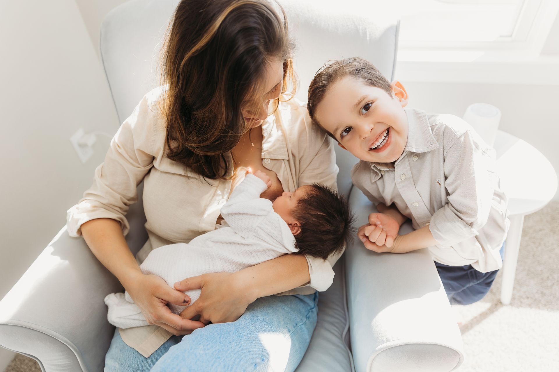 Newborn in Home session in Cary NC siblings and mother