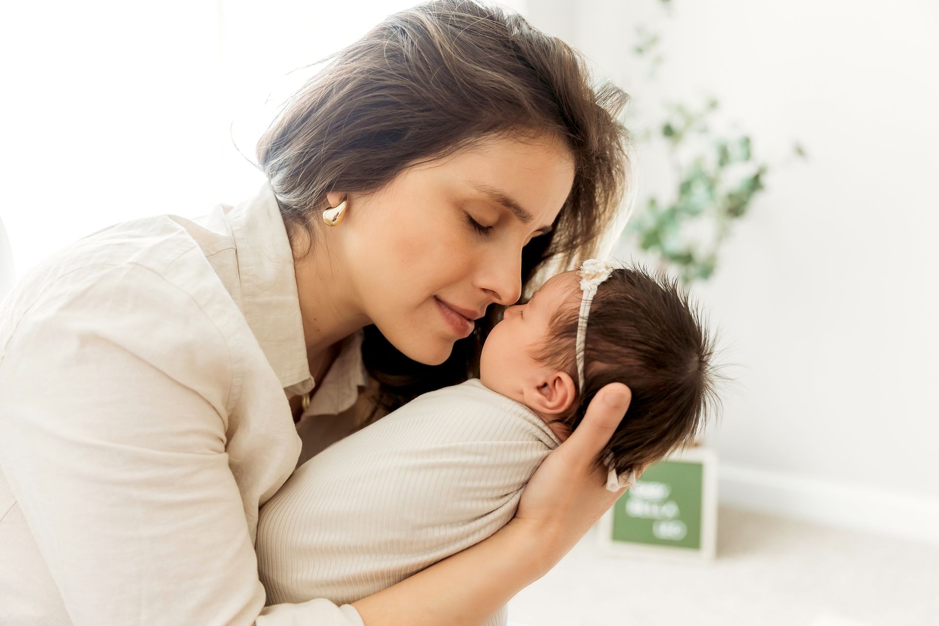 mother and the baby moment newborn in-home session portraits with Luciana Galucci Photography