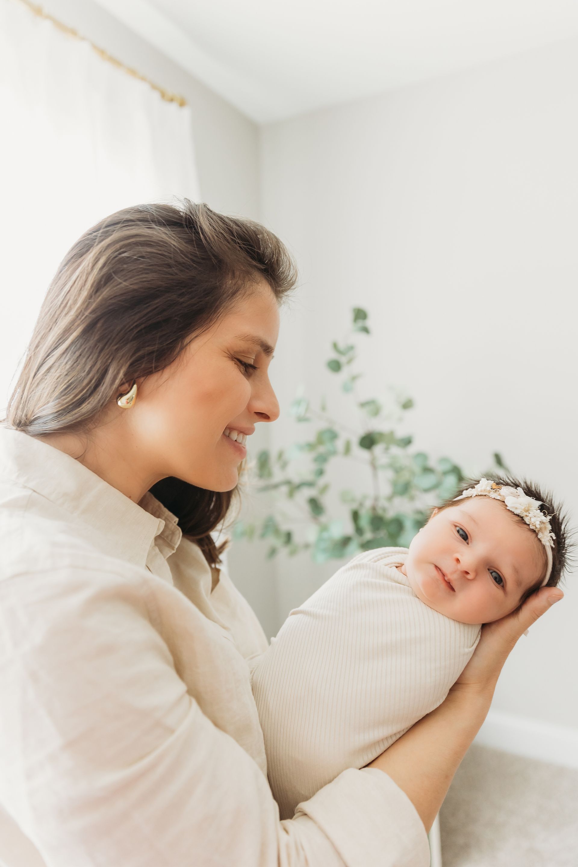 Newborn in Home session in Cary NC mother and the baby