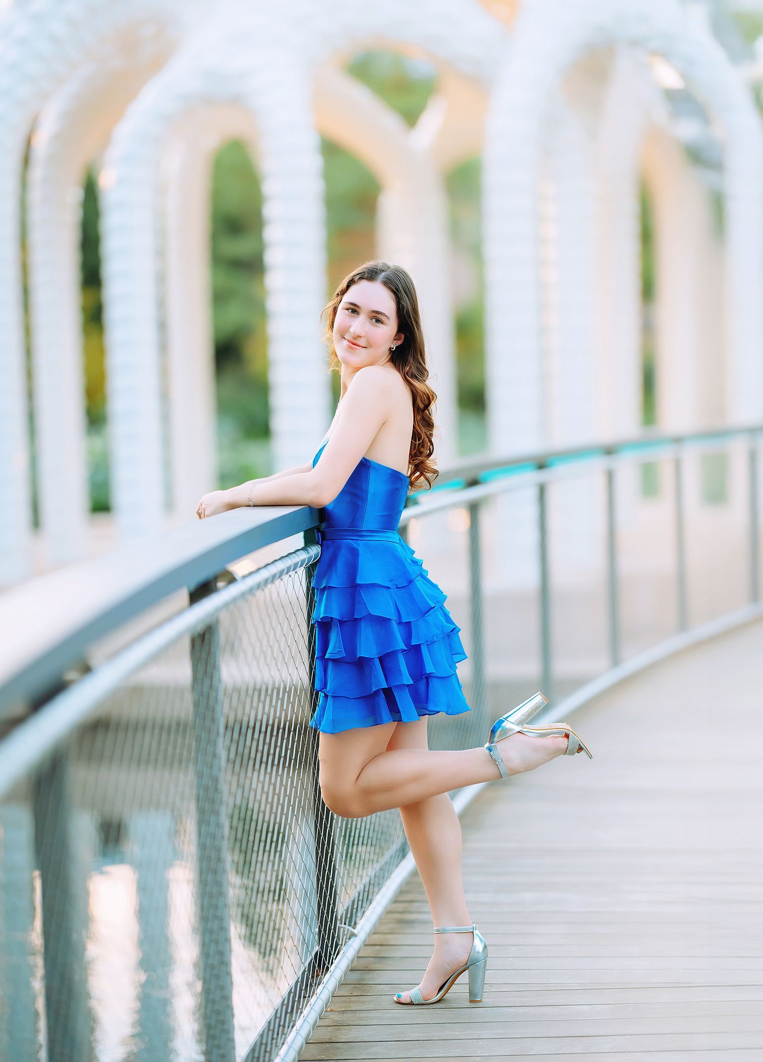 High school senior graduation photos in Cary NC with cap and gown by Luciana Galucci Photography