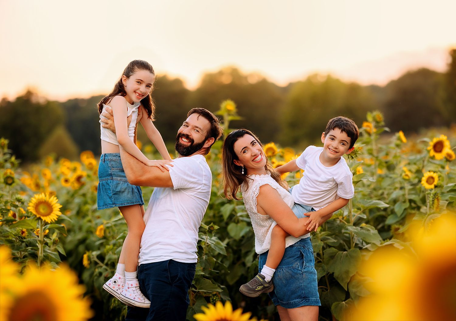 Family photoshoot in Raleigh private farm sunflowers field