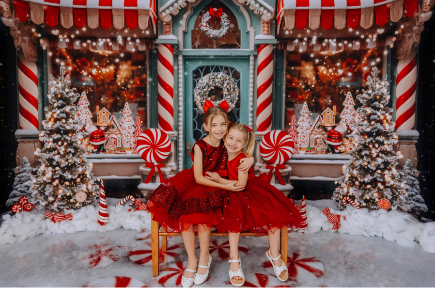 Raleigh NC 2024 Christmas Themed Studio Mini Sessions.
A whimsical holiday scene featuring candy cane stripes, peppermint accents, and festive decorations, perfect for capturing joyful moments in a cozy studio setting.