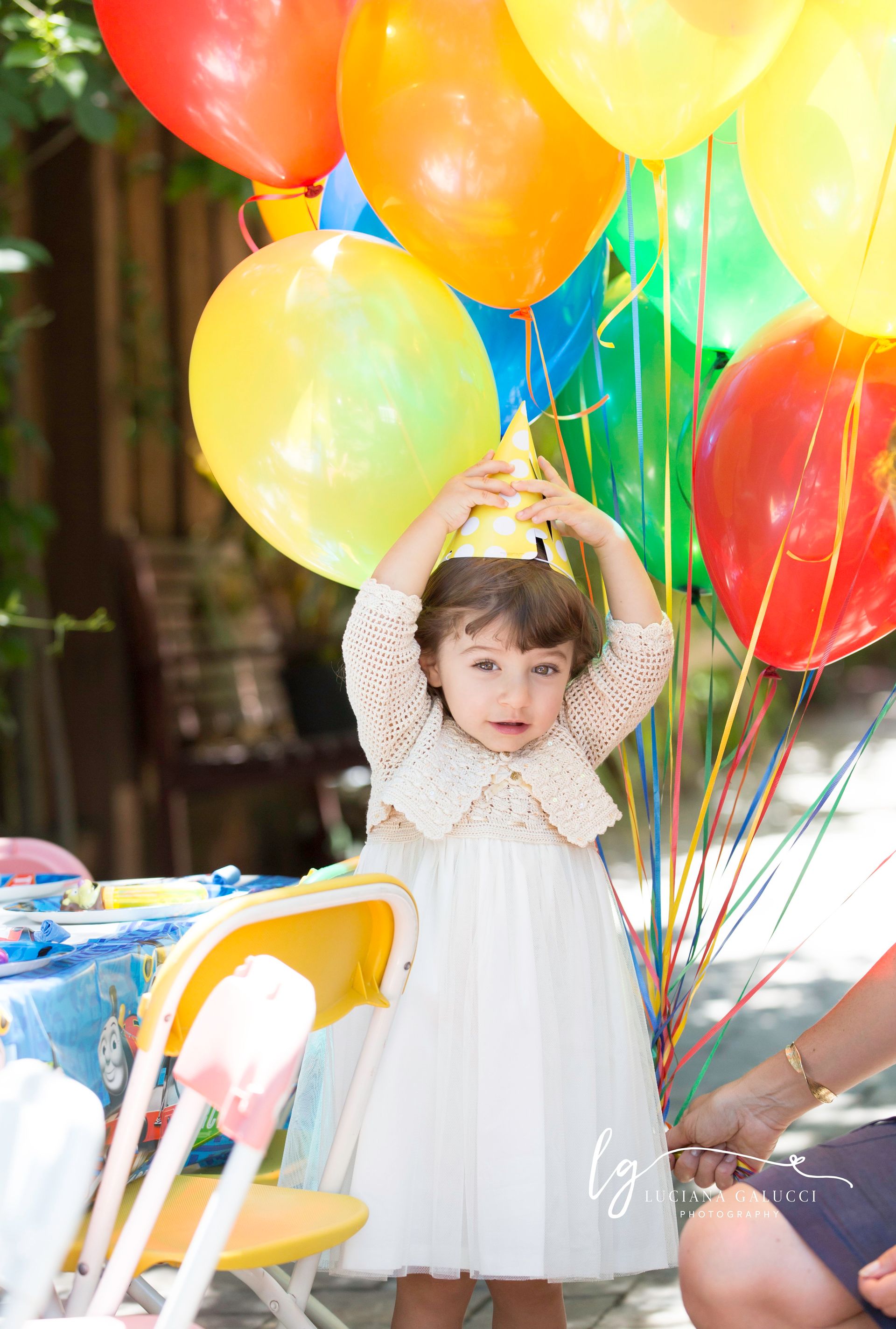 Toddler Girl colorful Birthday Party balloons