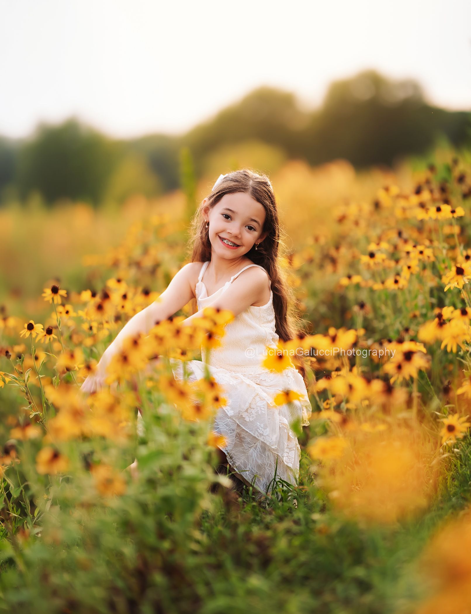 Natural portrait of a young girl during a Raleigh family photography session.