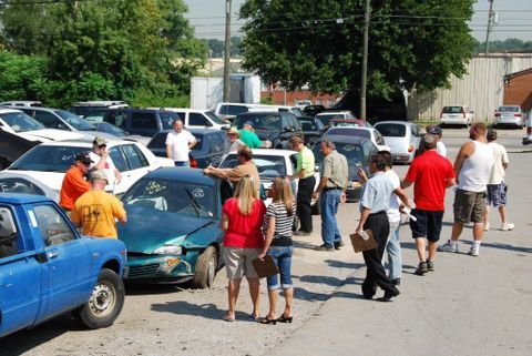 People Looking On The Wrecked Car — Nashville, TN — Martin’s Wrecker Service People Looking On The Wrecked Car — Nashville, TN — Martin’s Wrecker Service